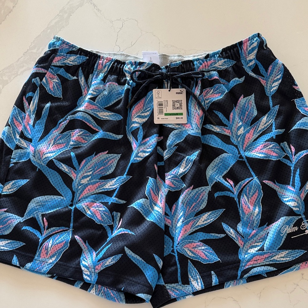 Men’s Puma NWT Blue and Pink Leaf Print shorts. Size Large